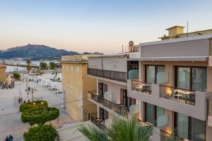 an aerial view of a building in a city at Alektor Luxury Apartments in Zakynthos Town