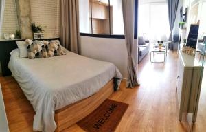A bed or beds in a room at Apartamento vista bonita