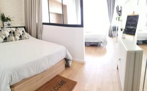 A bed or beds in a room at Apartamento vista bonita