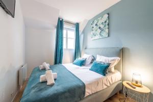 Ένα ή περισσότερα κρεβάτια σε δωμάτιο στο The Fabulous - Apartment 6 Pers 10min Disney