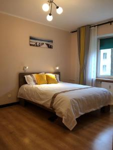 Posteľ alebo postele v izbe v ubytovaní Travel Apartment