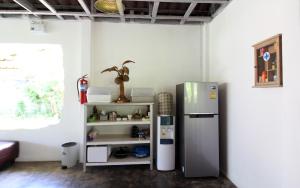 Kuchyň nebo kuchyňský kout v ubytování Malee Malee Guesthouse