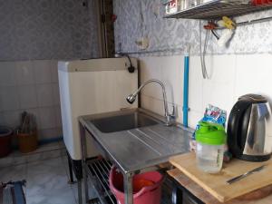 Cucina o angolo cottura di Vanny's Peaceful Guesthouse