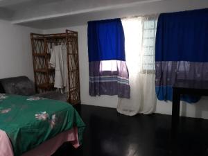 Letto o letti in una camera di Vanny's Peaceful Guesthouse