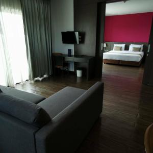 Postel nebo postele na pokoji v ubytování Coco View Hotel