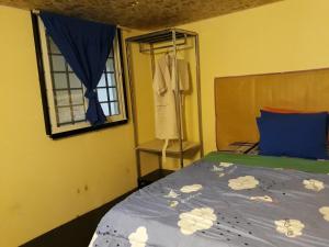 Letto o letti in una camera di Vanny's Peaceful Guesthouse