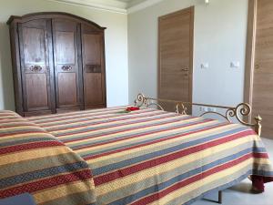 Postel nebo postele na pokoji v ubytování B&B Bee