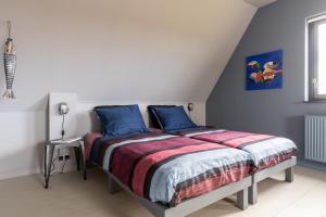 Postel nebo postele na pokoji v ubytování B&B Stil de Tijd