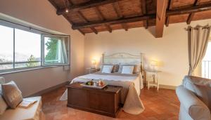 A bed or beds in a room at Antica Residenza Montereano