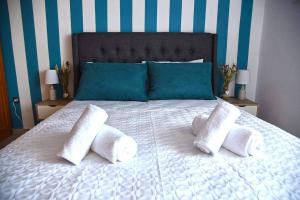 Posteľ alebo postele v izbe v ubytovaní Pogonia Sea View Apartment