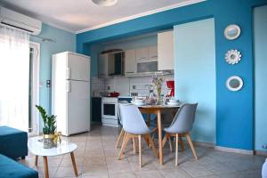 Kuchyňa alebo kuchynka v ubytovaní Pogonia Sea View Apartment
