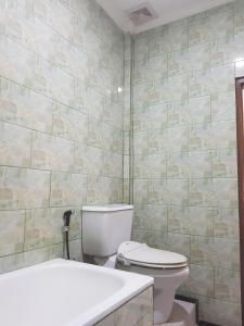 Phòng tắm tại Yogi Homestay