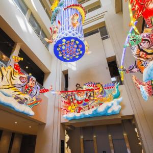 a view of a building with chinese decorations at ART HOTEL Aomori in Aomori