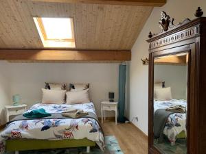 Postel nebo postele na pokoji v ubytování La Ferme de Chateauvieux