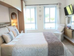 Ліжко або ліжка в номері Boutique Country House Aldergrove