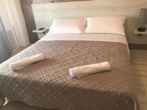 Postel nebo postele na pokoji v ubytování Albergo Ristorante Uspa + 26 fotografií