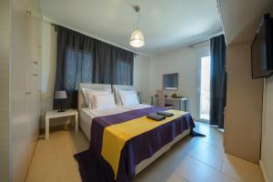 Ένα ή περισσότερα κρεβάτια σε δωμάτιο στο Villa Luminous +61 φωτογραφίες