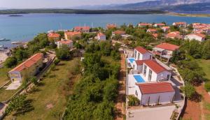 an aerial view of a small town by the water at Casa Bela in Klimno +36 photos