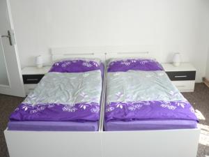 Postel nebo postele na pokoji v ubytování Apartmán U paní Věrky