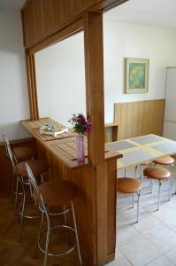 a dining room with a table and chairs at Kwatery Pracownicze TOLEK in Warsaw