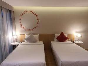 Postel nebo postele na pokoji v ubytování Platinum hotel
