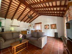 Posezení v ubytování Vivienda Rural Atlántico Sur & Familias