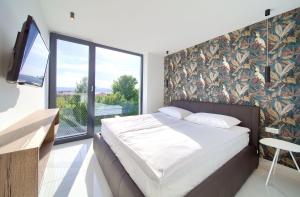 Posteľ alebo postele v izbe v ubytovaní Casa Forma + 37 fotografií