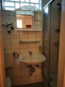 Ванная комната в Hotel Goldene Krone