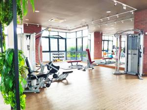 a gym with treadmills and elliptical machines at Le Pavilion by Salaam Suites, 5 pax, near Setiawalk in Puchong