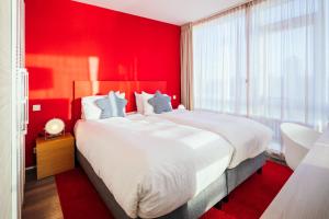 Voodi või voodid majutusasutuse Delta Hotel toas