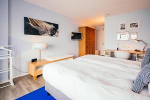 Voodi või voodid majutusasutuse Delta Hotel toas