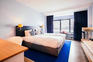 Voodi või voodid majutusasutuse Delta Hotel toas