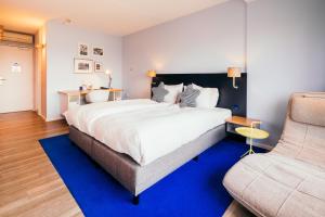 Postel nebo postele na pokoji v ubytování Delta Hotel + 37 fotografií