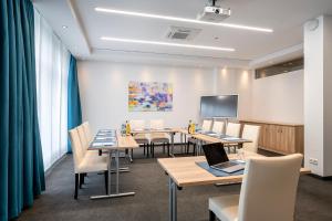 TV a/nebo společenská místnost v ubytování AVALON Hotel Bad Reichenhall