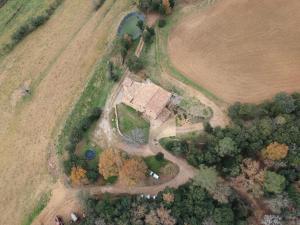 an aerial view of a house in a field at Masoveria De Lladó in Llado