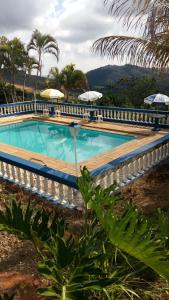 Bazén v ubytování Pousada Desfiladeiro da Serra nebo v jeho okolí