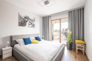 Postel nebo postele na pokoji v ubytování Dream4You Apartments