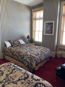 Ένα ή περισσότερα κρεβάτια σε δωμάτιο στο Hotel St Nicholas