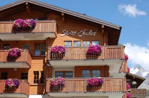 Balkón nebo terasa v ubytování Apartment Swiss Chalet