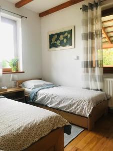 Postel nebo postele na pokoji v ubytování Chata Zaciszne Zastań