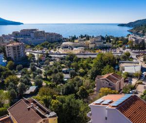 an aerial view of a town next to the water at Hotel Bono in Budva