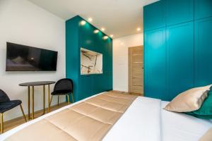 Ένα ή περισσότερα κρεβάτια σε δωμάτιο στο GreenRoom Kunigiškės