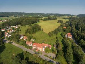 an aerial view of a house on a hill at Landhotel Kühler Grund in Grasellenbach