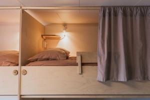 Letto o letti in una camera di FURU Hostel & Café