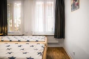 Säng eller sängar i ett rum på Altstadt Apartment Alisa