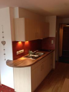 A kitchen or kitchenette at Sonnleiten - Guggerhof - Villa Sonnenwies