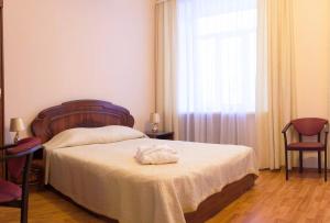 Krevet ili kreveti u jedinici u objektu Apart Hotel Cherepovets