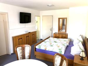 Postel nebo postele na pokoji v ubytování Hotel Charlott