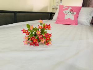 Postel nebo postele na pokoji v ubytování Baan Mae Somkid Homestay