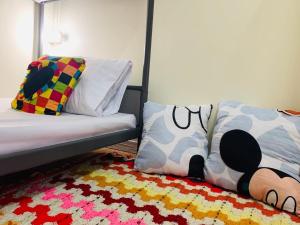 Postel nebo postele na pokoji v ubytování Baan Mae Somkid Homestay